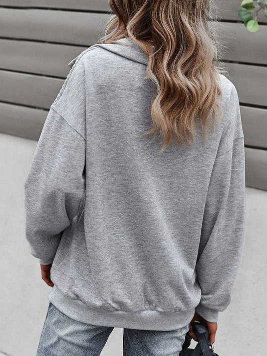 back of gray quilted sweatshirt